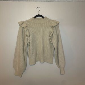 Cream sweater with ruffles